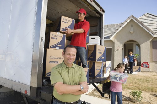 Packed boxes and furniture prepared for a Shepherds Bush move