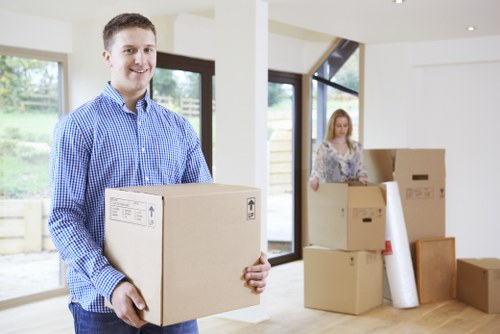 Loading furniture and boxes into a moving van in West London