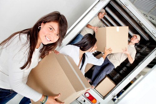 Packed boxes and furniture ready for a Shepherds Bush home move