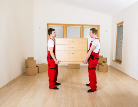 Packed office equipment and furniture ready for relocation